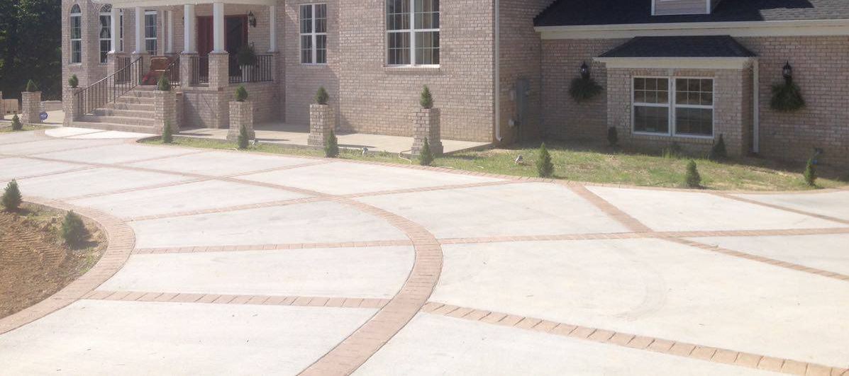 stamped and stained concrete driveway our crew replaced at a chesapeake residence