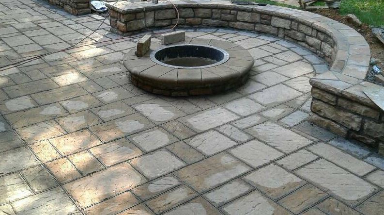 stamped concrete work we've done on a patio with a fire pit in chesapeake, va